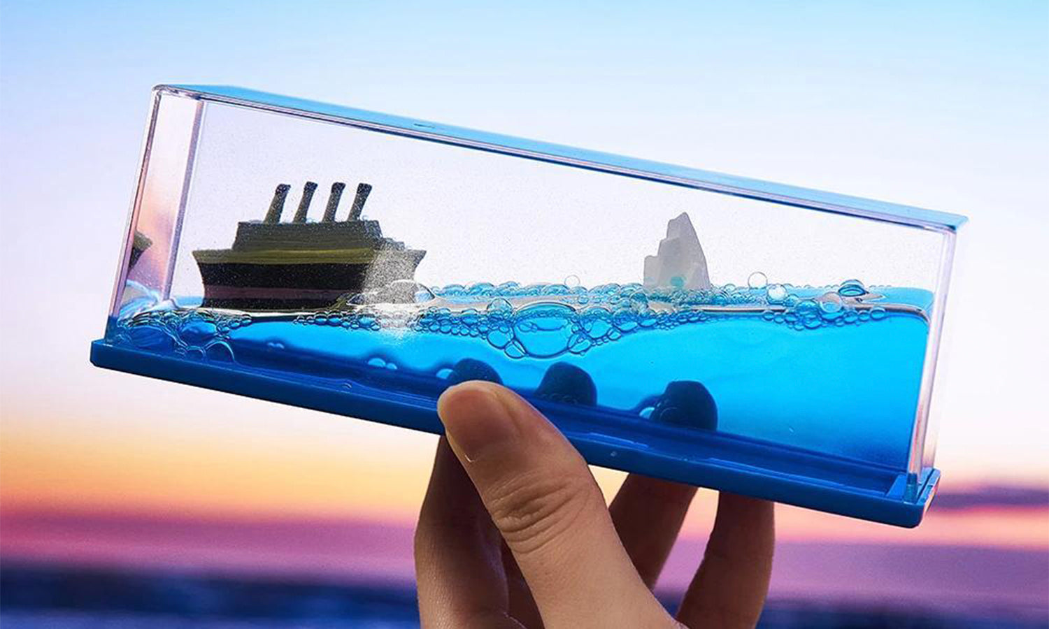 https://thenovibox.com/cdn/shop/files/53Cruise_Ship_Fluid_Drift_Bottle3.jpg?v=1692247919&width=1500